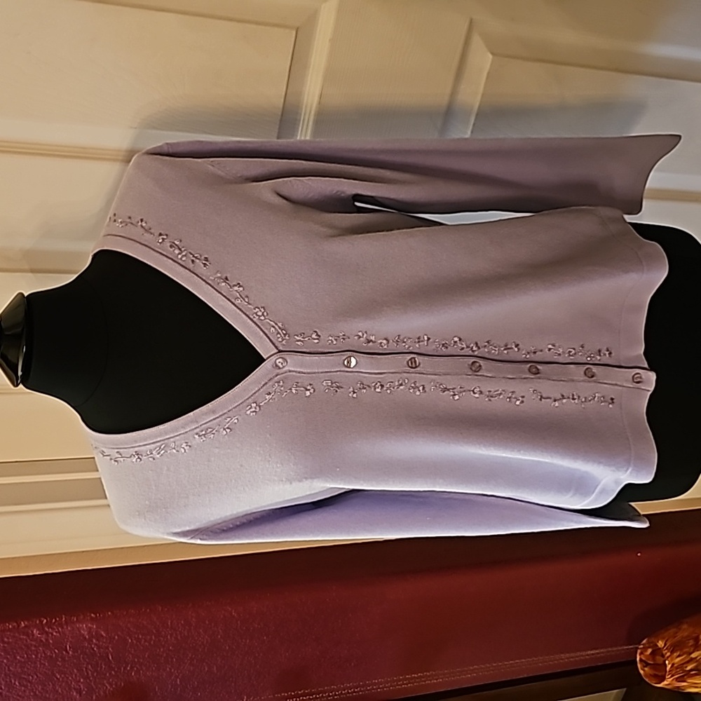 Lavender long sleeve sweater.